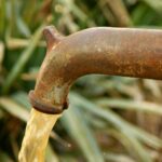 Spring,Water,Hand,Well,Pump,With,Dirty,Contaminated,Water,Outlet